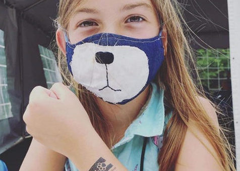 Girl with cat mask